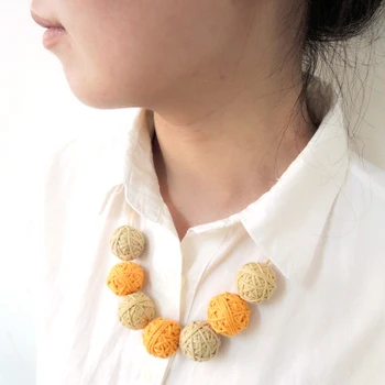 

Wholesale Ribbon autumn color orange khaki cotton yarn crocheted ball necklace everyday jewelry EN05