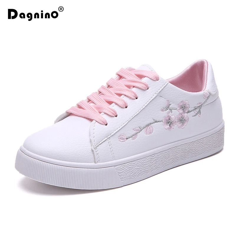 white sneakers with flowers