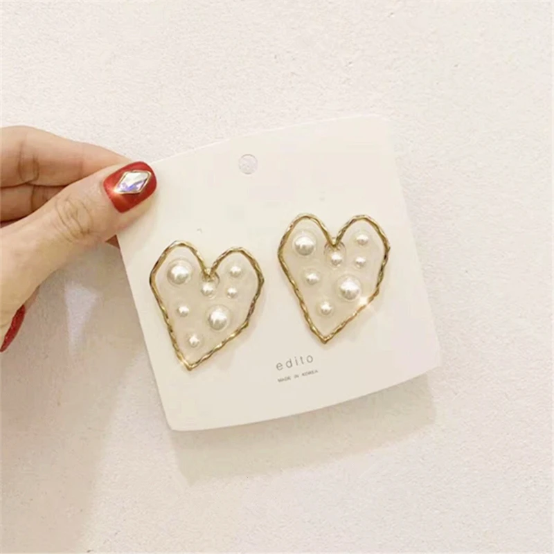 HUANZHI новые S925 Серебряные иглы геометрические сердца бесцветный прозрачный жемчуг стереоскопический Bump металлические серьги-гвоздики для женщин