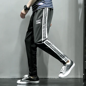 

K66 days spring new color letter ribbon casual Haren trousers male enlarging code not less than 69 P50