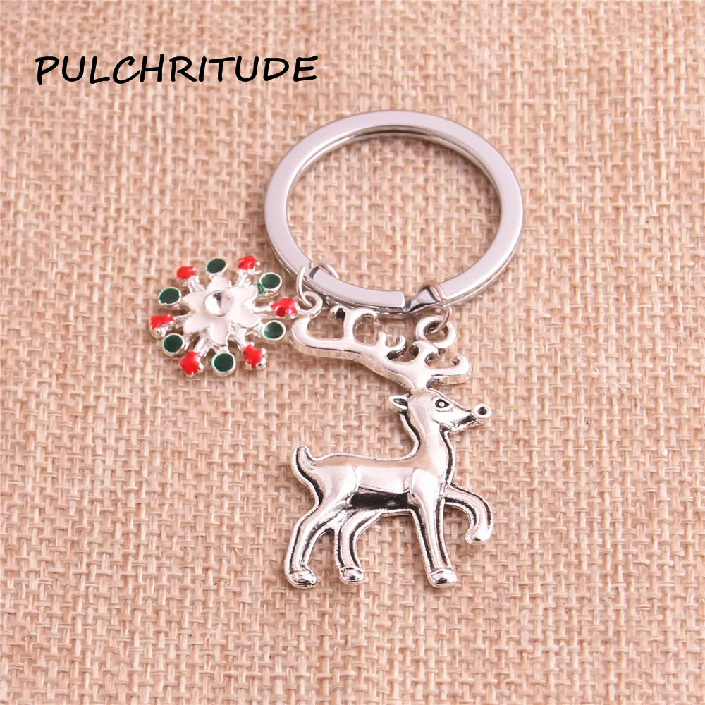 

PULCHRITUDE 3pcs Silver Drop Oil Snowflakes Christmas Tree Deer Snowman Bells Charm Key Chain Fit Diy Jewelry Making c2037