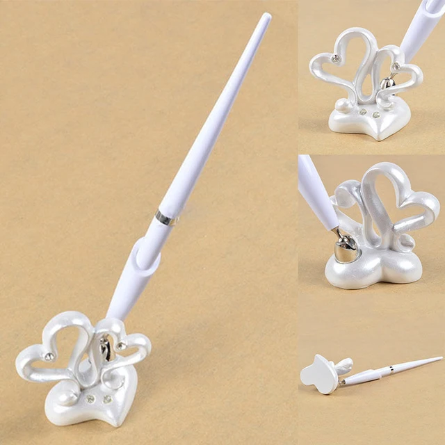 wedding reception guest pen with heart design decor double heart