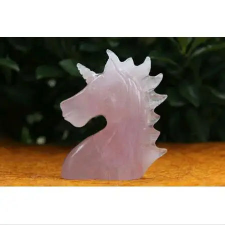 Natural pink crystal hand-carved unicorn