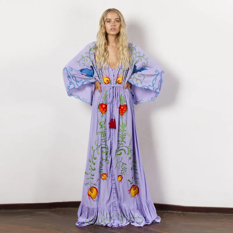 

Summer new dress Bohemian travel holiday island beach dress ultra-loose embroidery flowers retro tassel ultra-long dress