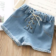 Летние потертые джинсовые шорты для девочек