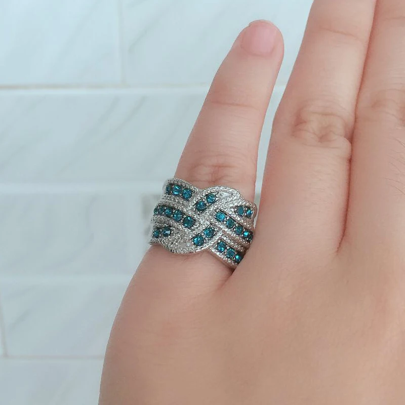 

Hyperbole Blue Stone Crystal Cubic Zircon Twist Wave Women Ring Wedding Band Romantic Female Finger Ring Engagement Party DDR132
