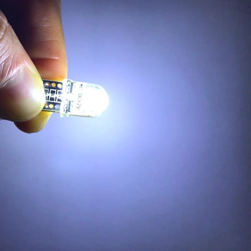 100pcs AC/DC 12V T10 Silicone 4 smd 3030 Led Non polar 168 194 car interior instrument lights Door Reading License Plate Lamp