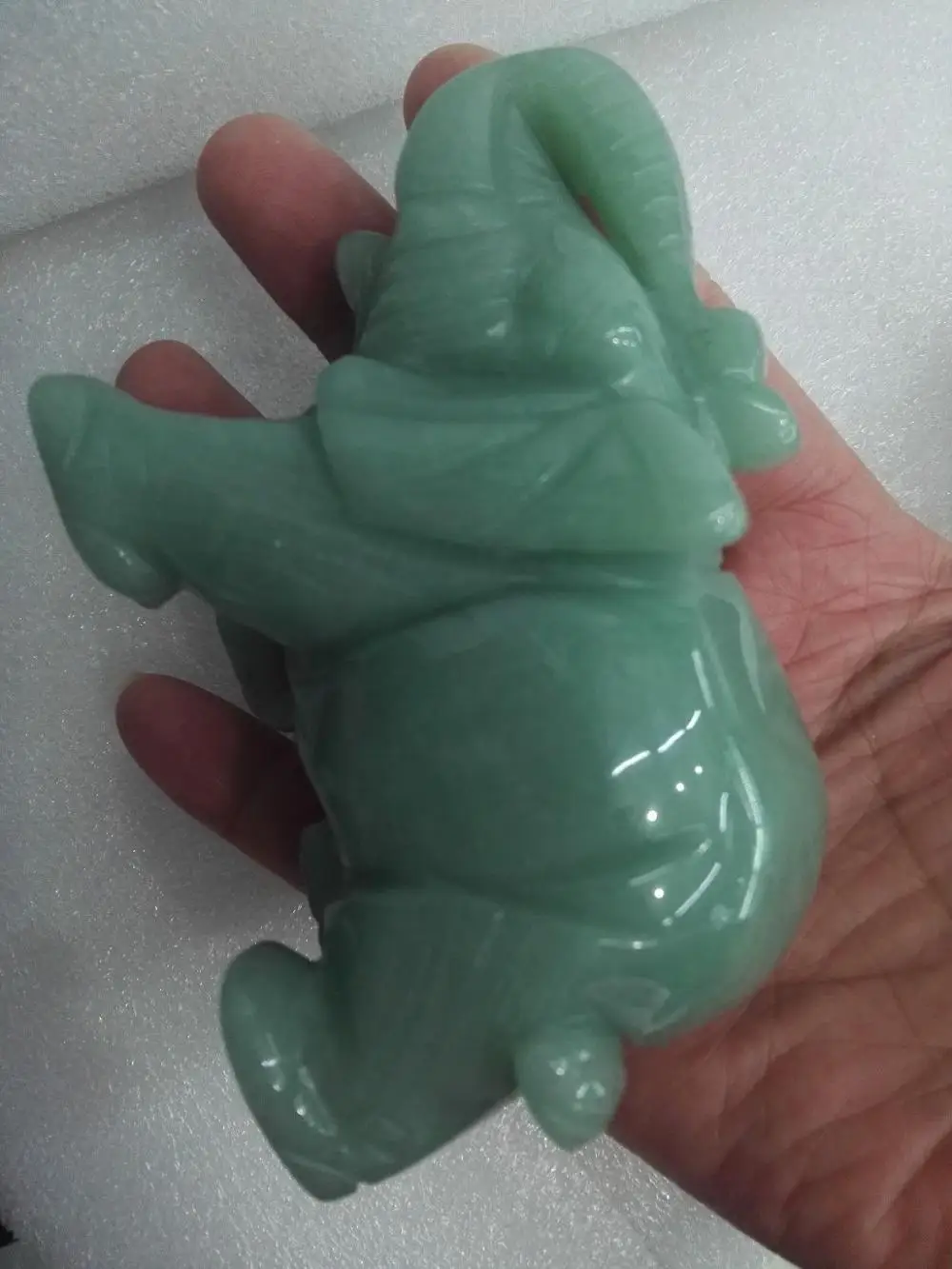 

Hand carved natural green Tanglin jade elephant ornaments