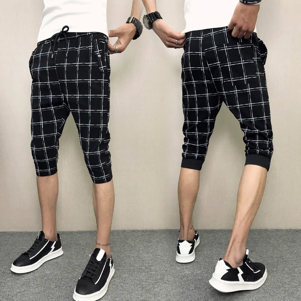 

Social youth fashion men's spirit guy Plaid feet casual pants trend Slim fast hand network red seven pants men