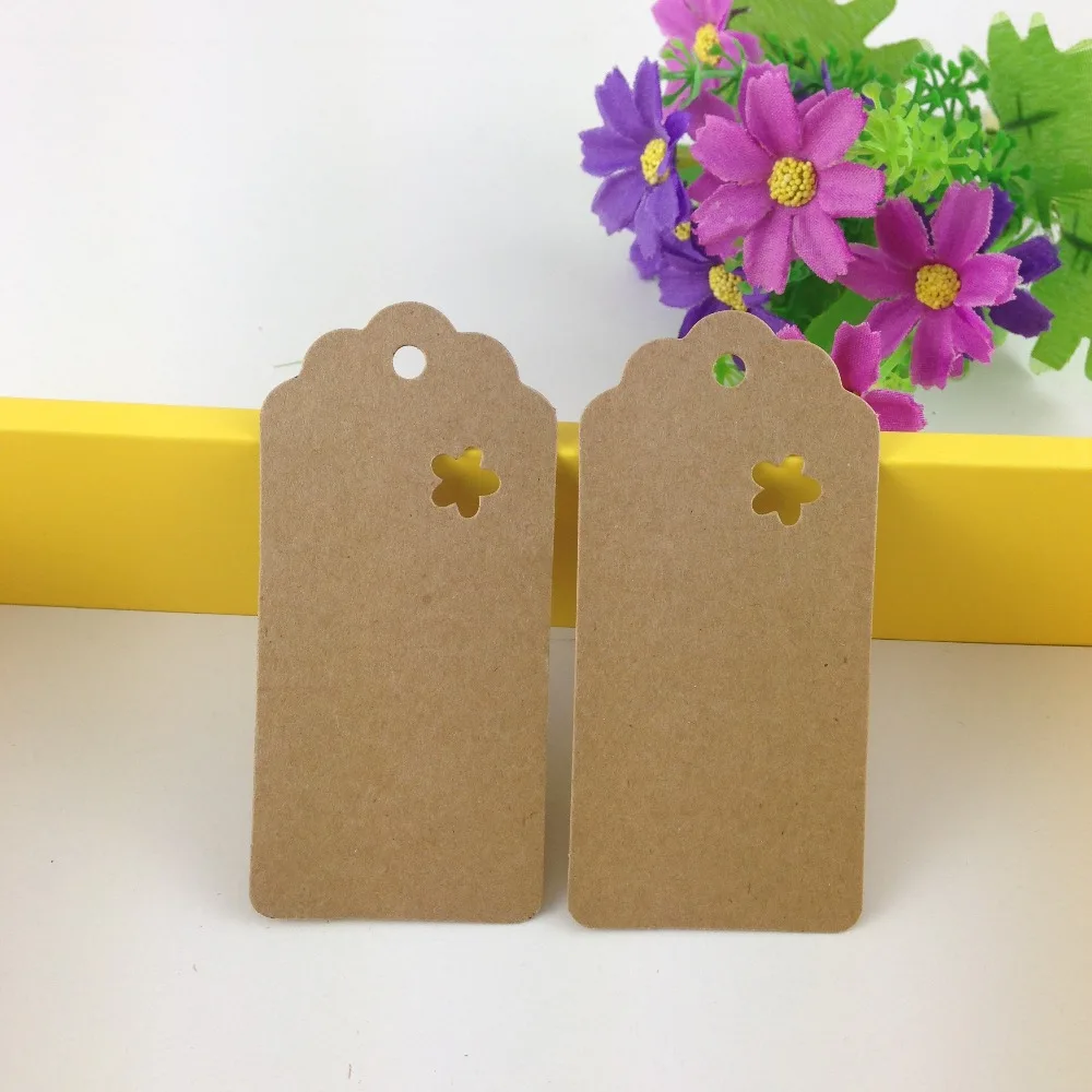 

Wholesale 200PCS Garment Tags 9.5x4.5cm Kraft Price Tags Blank Paper Cards Hollow Flower DIY Gift Tags Accept Custom Logo