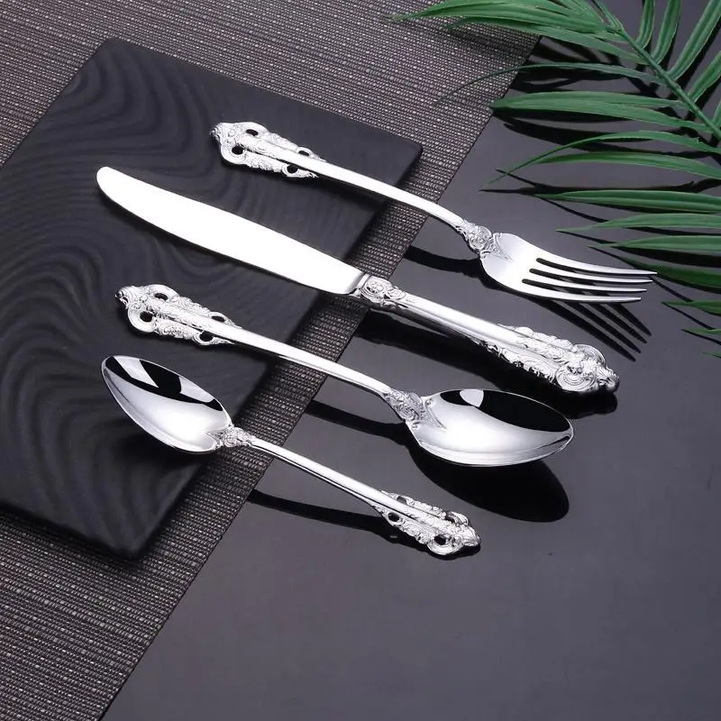 silver dinnerware set  (2)