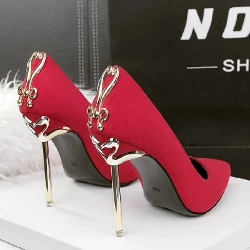 

Korean fashion pointed high heels European and American sexy metal with women's shoes stiletto bow shoes.