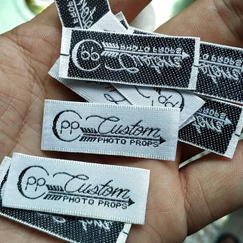 

1000pcs , 4 * 1.5 cm Custom Straight cut White anti-satin ribbon cloth woven label clothing