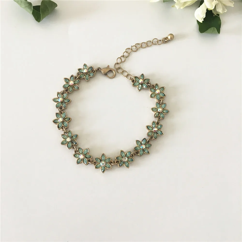 

PRETTY WORN GOLD COLOR PLATING MINT STONE FLORAL BRACELET(ANKLET) FOR WOMEN