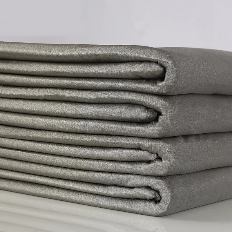 

Silver fiber elastic warp-knitted maternity radiation-proof conductive fabric wraps the phone to reduce the signal