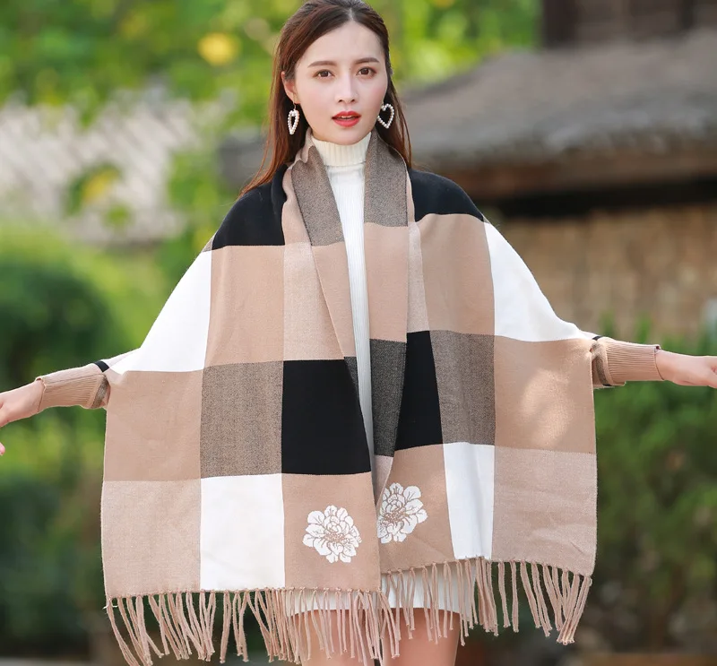 Female autumn and winter large plaid shawl dual-use cloak tassel double-sided jacquard bat sleeve sweater jacket