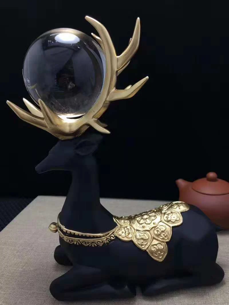 

70 mm high quality natural transparent white crystal ball with a beautiful deer shaped base
