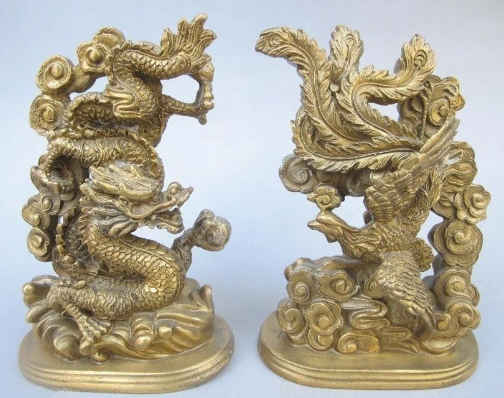 

The ancient Chinese handmade bronze statue of a dragon phoenix mascot