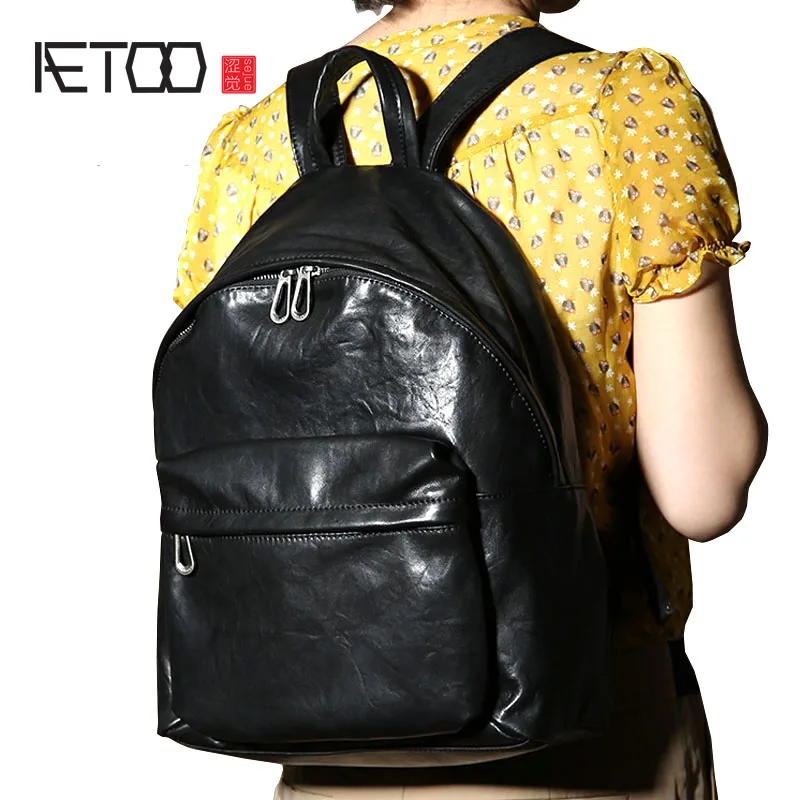 

AETOO Genuine Leather Shoulder Bag Men and Women Bag Backpack Black Soft Calfskin Pack Casual Student Pack