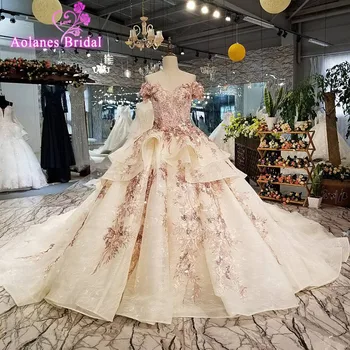 شراءفساتين زفاف فاخرة من Aolanes 2018 بدون أكمام من التل الشامبانيا ، ثوب حفلة ذيل ملكي على شكل قلب ، رداء De Mariee مكشوف الكتفين
