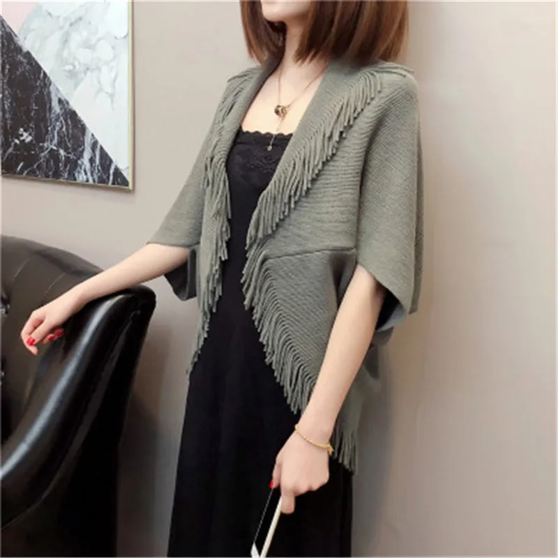 Фото Autumn Winter Knitted Cardigans Coat Women 2019 Fashion Half Sleeve Batwing Poncho Sweater Beautiful Womans Tassel Cardigan |