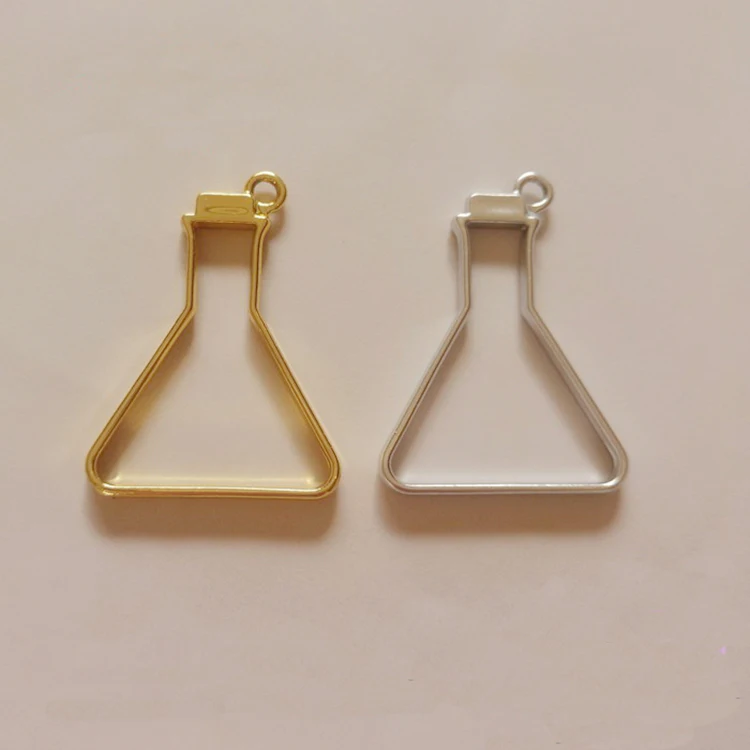 

GLADZGT 10 pcs/lot Reagent bottle Metal Frame Pendant Gold Charm Bezel Setting Cabochon Setting UV Resin Charms