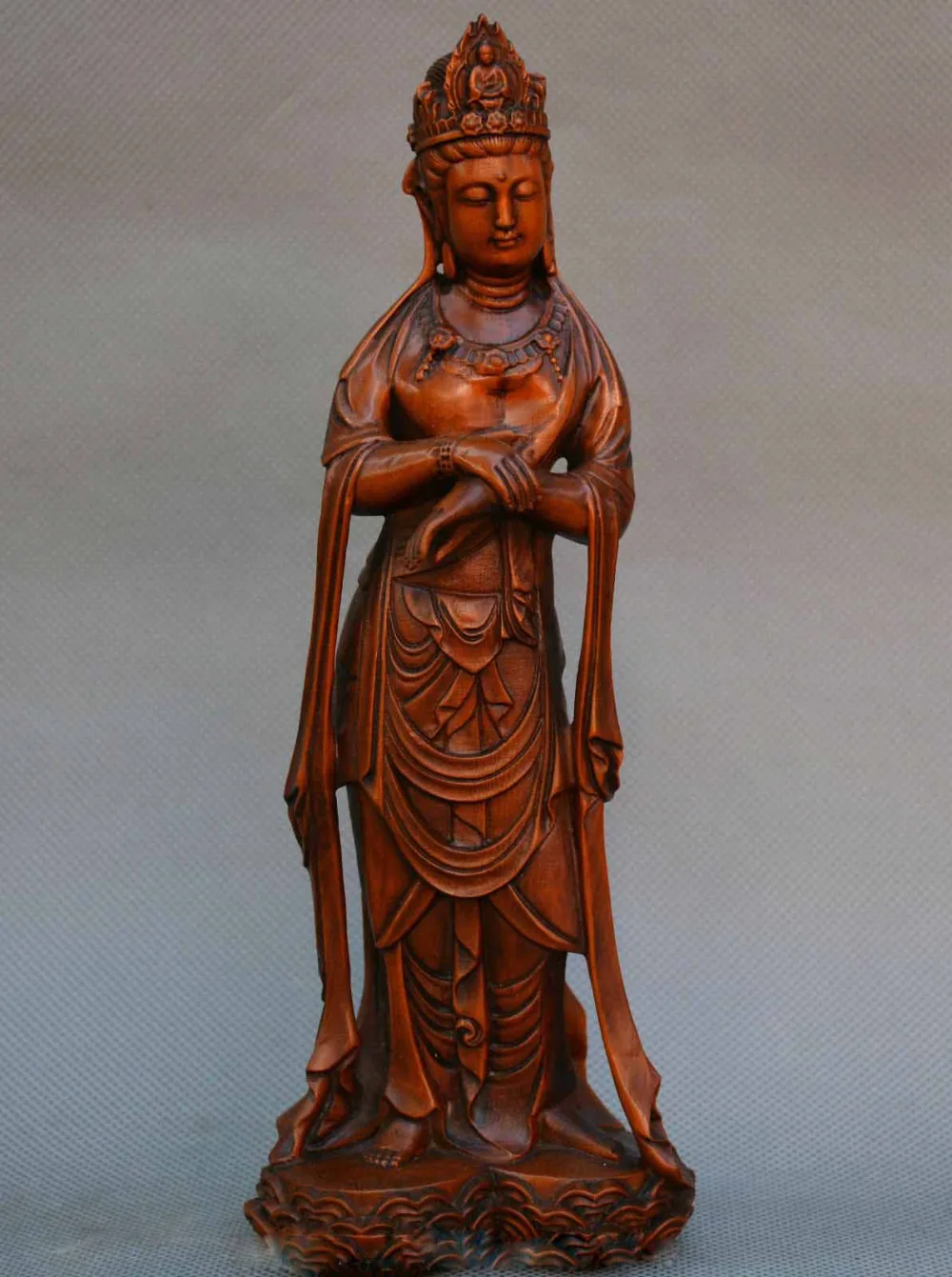 

Details about Collect Chinese box-wood Hand carved stand Kwan-yin Guanyin Goddesses statue