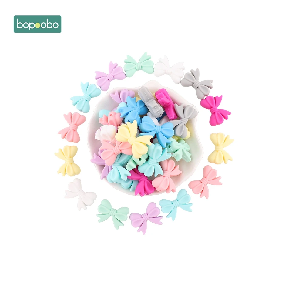 

Bopoobo 10pc Baby Teether Mini Silicone Bow Small Tie Food Grade Teether Holes DIY Beads 2cm Rosette BPA Free Silicone Beads