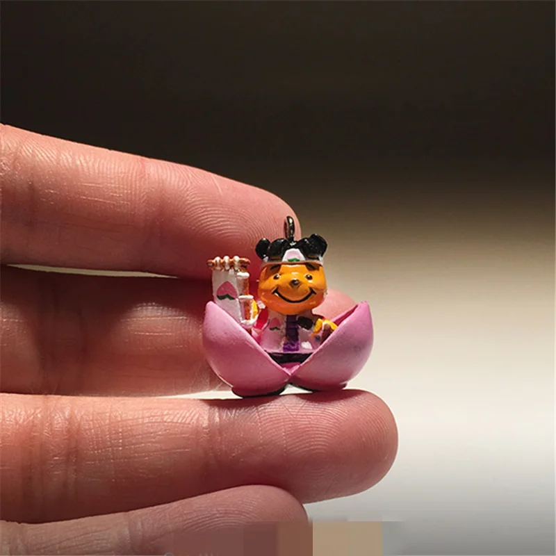 

60piece 2cm cute yellow mini bear inside of peach Action Figures very small bear Collection Figure Toy Loose Toy