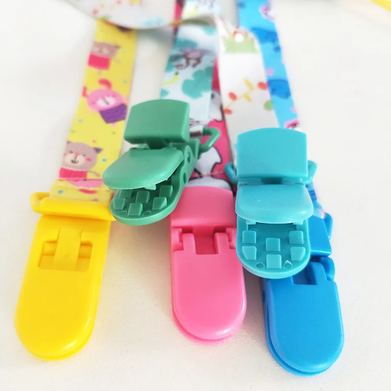 5pcs-baby-pacifier-clips-chain-cartoon-baby-nipple-feeding-pacifier-chain-clip-holder (1)