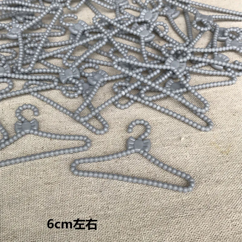 

10PCS Blyth Dolls clothes Accessories Plastic Gray Bowknot Hangers For Pullip ,Barbies Dress Girl Pretend Play House Toys