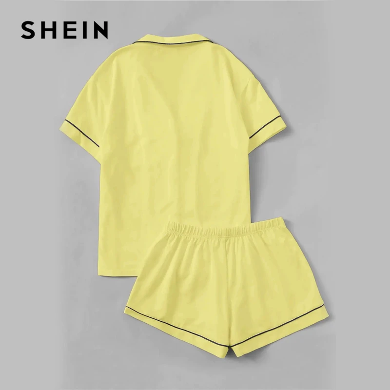 Comprar SHEIN contraste de pipas de bolsillo delantero pijama conjunto negro de manga corta solapa superior con cintura elástica pantalones cortos para mujer conjuntos de dos piezas
