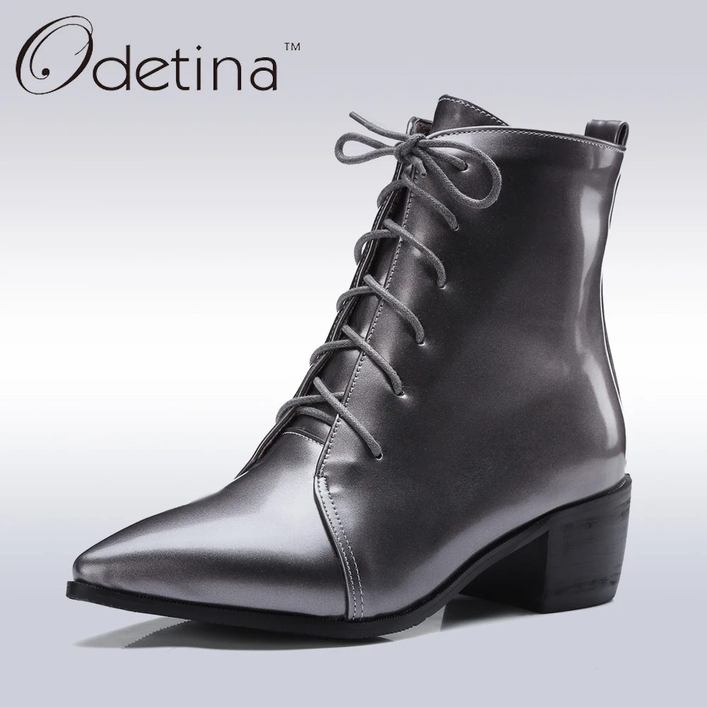 black pointed toe lace up boots