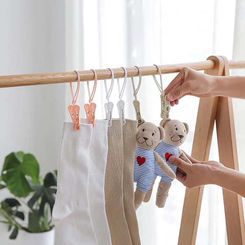 12pcs Plastic Clothes Peg Home Travel Portable Storage Hangers Rack