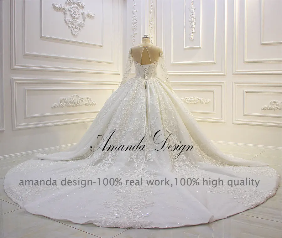 Свадебное платье с длинными рукавами и кружевной аппликацией Amanda Design