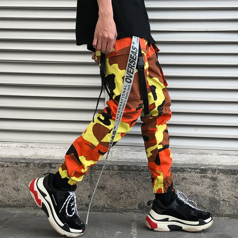 orange black and yellow camo pants