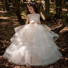 Nuovo vestito da ragazza di fiore elegante Appliqué di pizzo Champagne senza maniche a cascata abiti da spettacolo per bambini per matrimoni prima comunione Dres