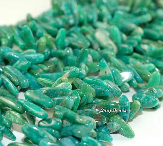 

Aqua Berry Russian Amazonite Gemstones Stick Pebble Chip 23X8MM Loose Beads 7.5 inch Half Strand (90108484-106)