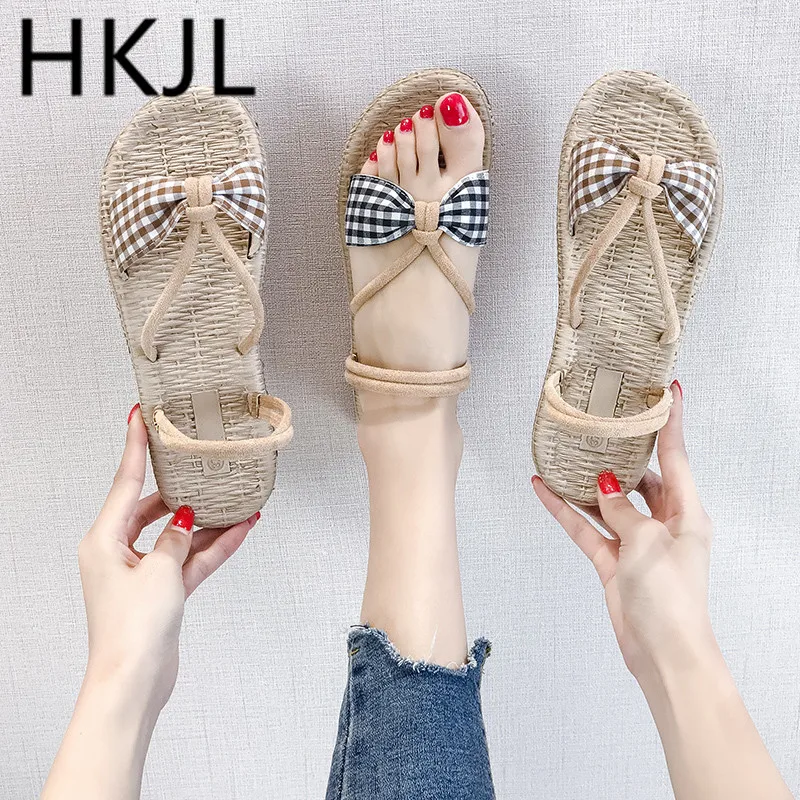 

HKJL Slippers female 2019 sandals fairy wind students wild bow retro flat beach Rome new women's slippers A522