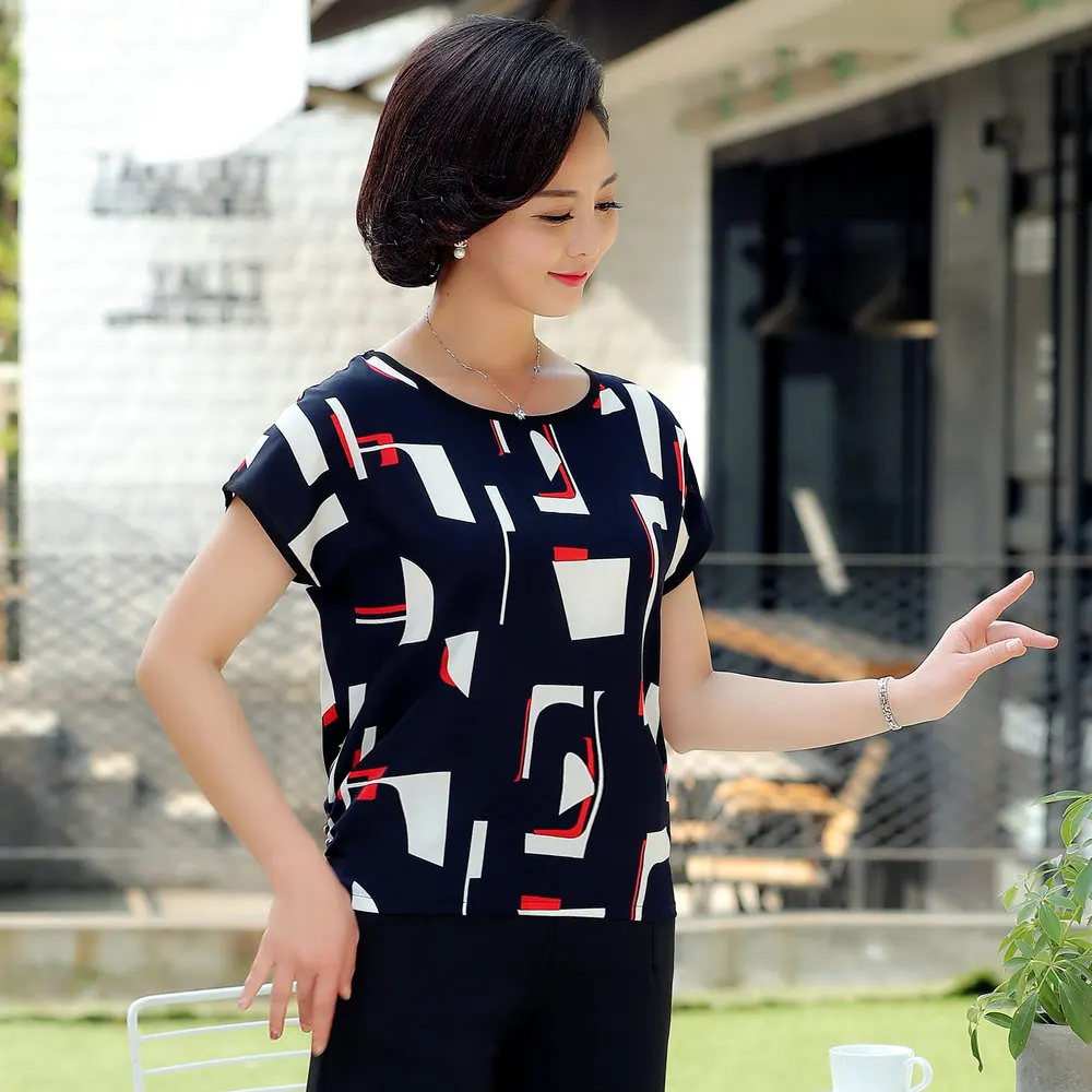 Women Summer Blouses Short Drop Sleeve Round Collar Tops Female White Navy Blue Floral Print Tunic Shirt Woman Casual Blouse 5XL Women Summer Blouses Short Drop Sleeve Round Collar Tops Female White Navy Blue Floral Print Tunic Shirt Woman Casual Blouse 5XL