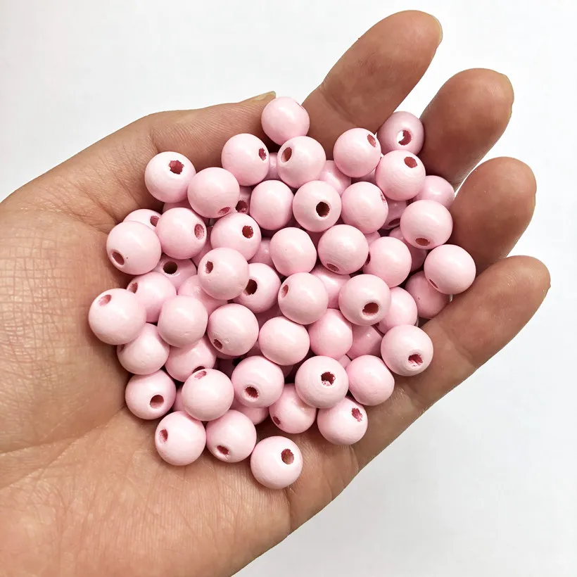 

Popular 10mm Wooden Beads Round Ball Wood Spacer Beads For DIY Jewelry Making Handcrafts 100Pcs/Set Wholesale Baby Pink Color