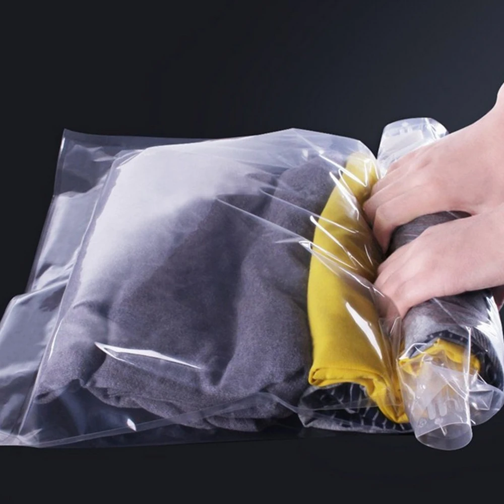 1 pc Clothes Compression Storage Bags Hand Rolling Clothing Plastic