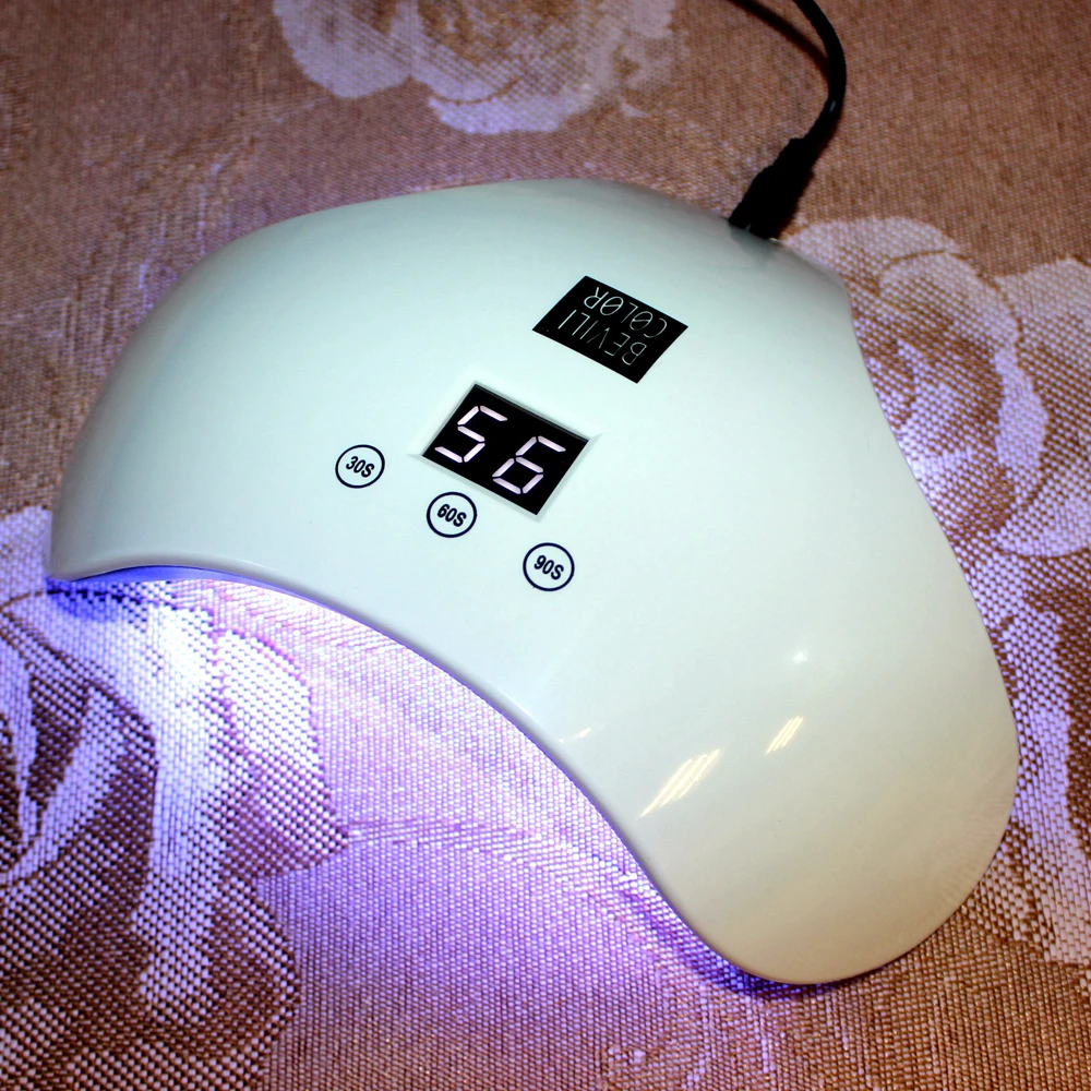 

36W LED Nail UV Lamp 18 LEDs Nail dryer for All Gels Polish Manicure with 30s/60s/90s button Perfect Thumb Solution Charging