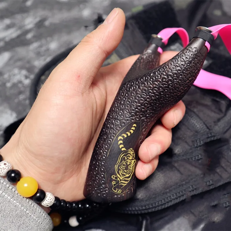 

Purple Sandalwood Wooden Slingshot with Flat Rubber Band Outdoor Games Powerful Slingshot with Gifts for Hunting Shooting