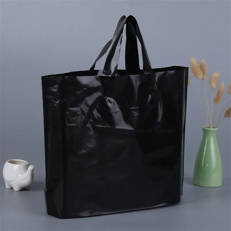 500pcs-lot-custom-logo-printed-plastic-packing-shopping-bags-with-handle-customized-garment-clothing-gift-packaging (1)