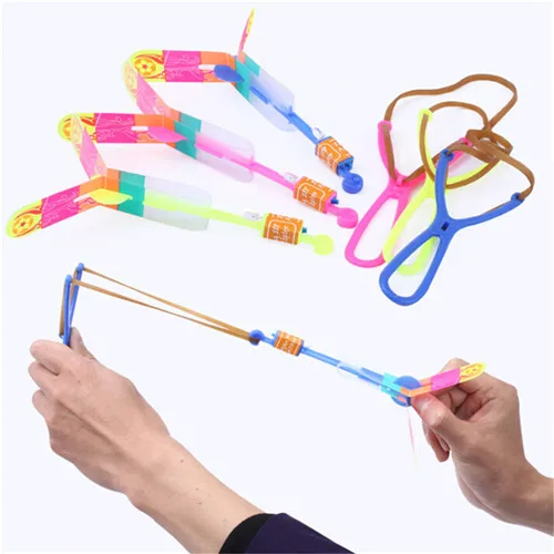 10pcs/lot Led Arrow Helicopter Flying Rocket Helicopter Flying Toy Slingshot LED Copter Lighting up Toy Fun Gift Outdoor Kid Toy