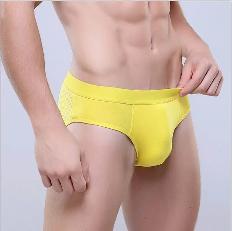 Super breathable breathable fabric modal silk hollow sexy briefs eight colors optionalin Briefs