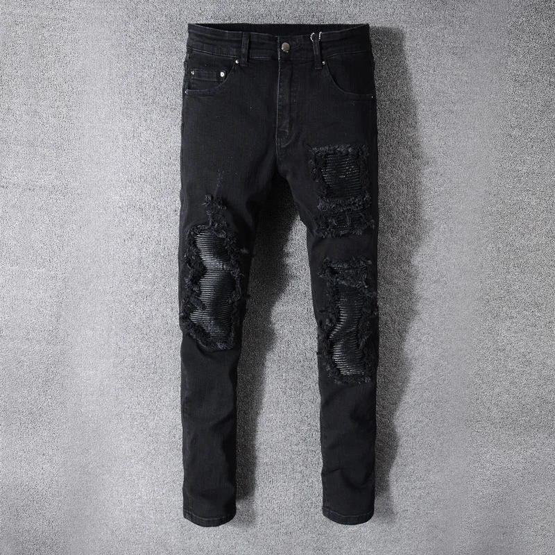 black ripped designer jeans