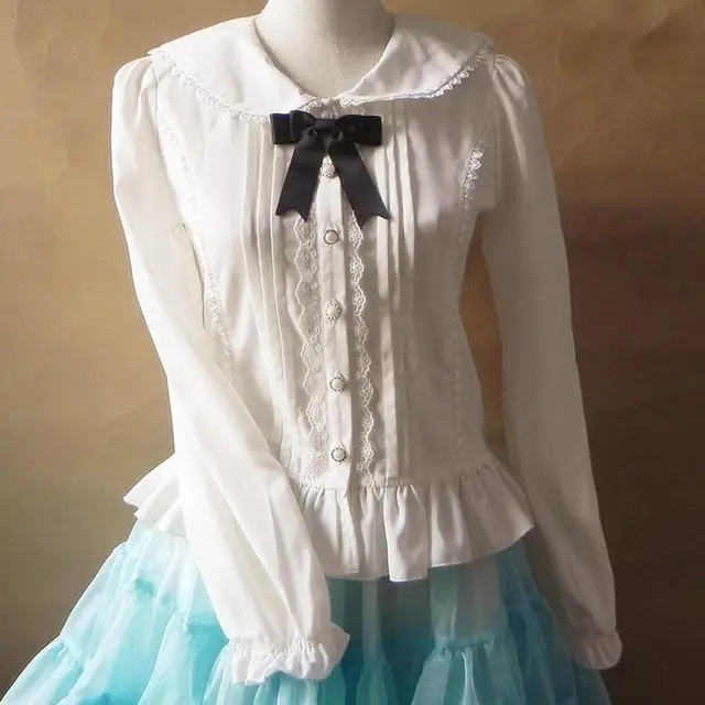 La nueva marca japonesa Lolita viento lindo encaje Camisa