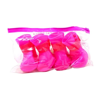The pet dog boots with four silicone antiskid shoes wear waterproof dogs shoes candy colored